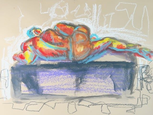 Manuel prone on a box