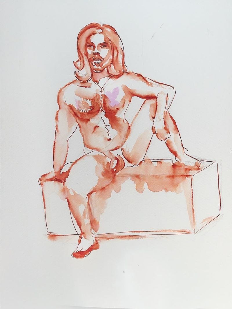 Val seated on a cube with one leg raised, painted in watercolor marker.
