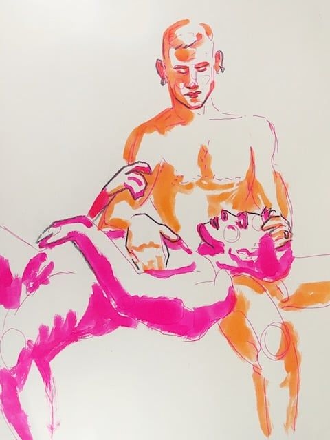 One man cradles another's head