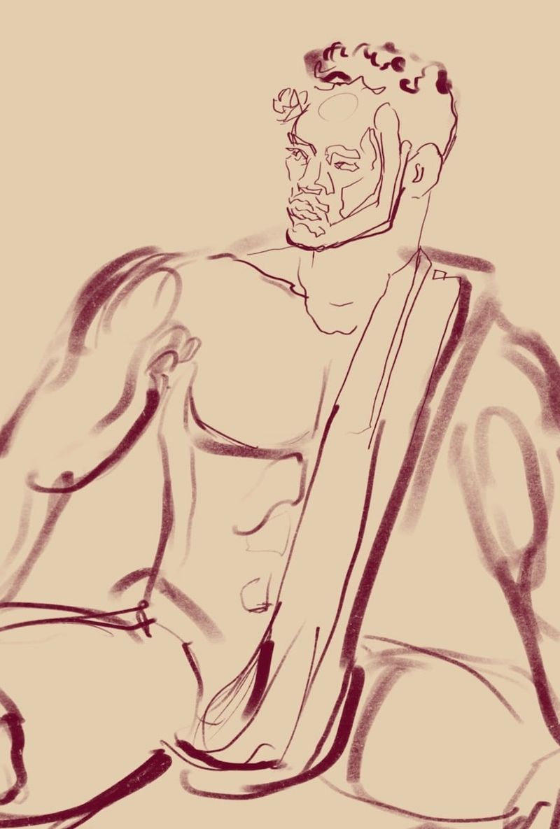 Izaiah draped in a flag like a toga