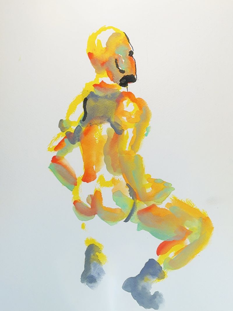 Back view of a male figure in a harness