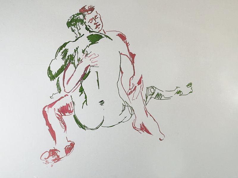 Models in a seated embrace