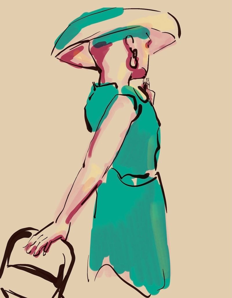 Shaquita rests her hand on a chair