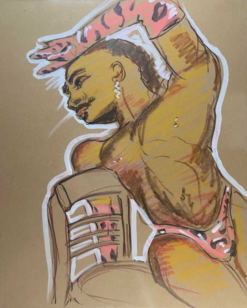 Deandre dramatically leaning over a chair