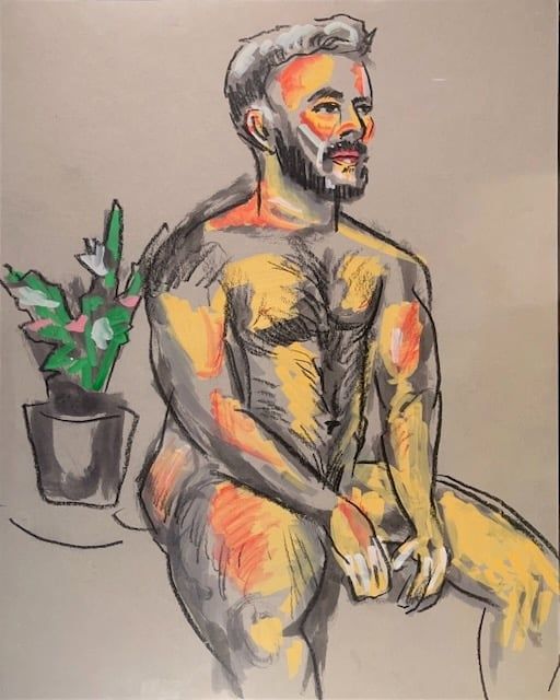 Mr. Teddy Bear Sitting next to flowers