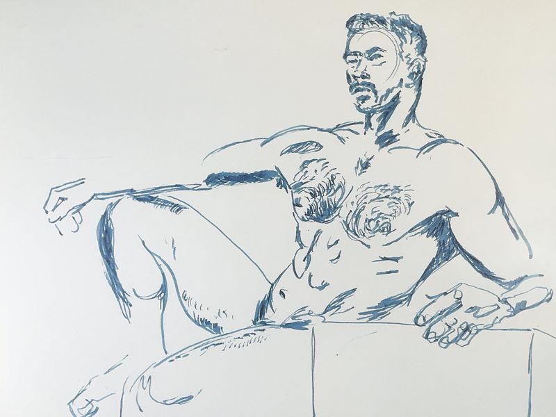 Model in fountain pen box pose