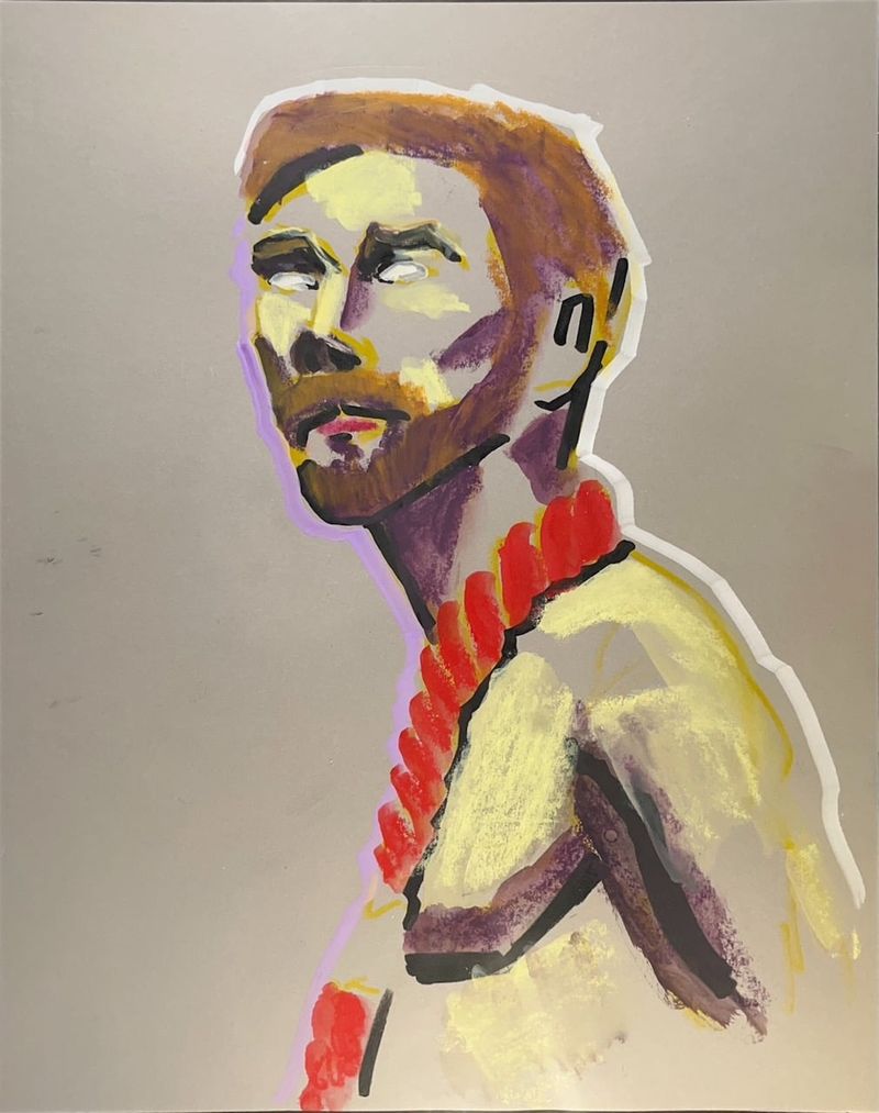 Joshua sits for a portrait with a rope